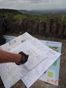 Navigator with many paper maps